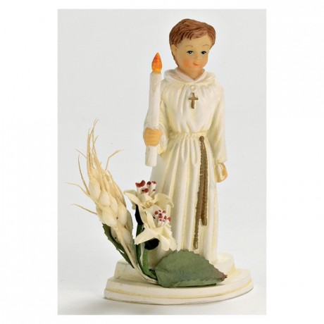 Boy communiant with candle